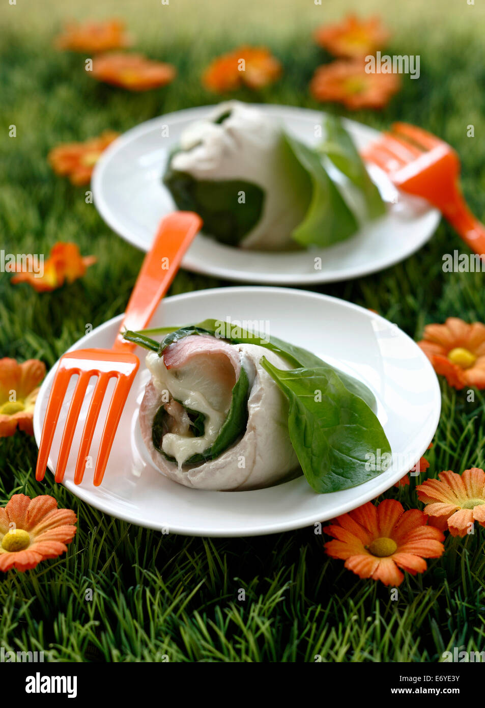 Steamed chicken,spinach and mozzarella rolls Stock Photo Alamy