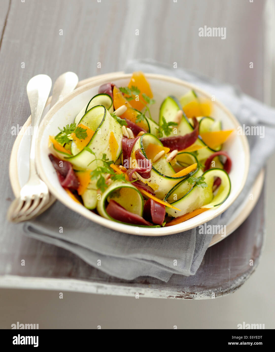 Zucchini,mimolette and duck magret salad Stock Photo