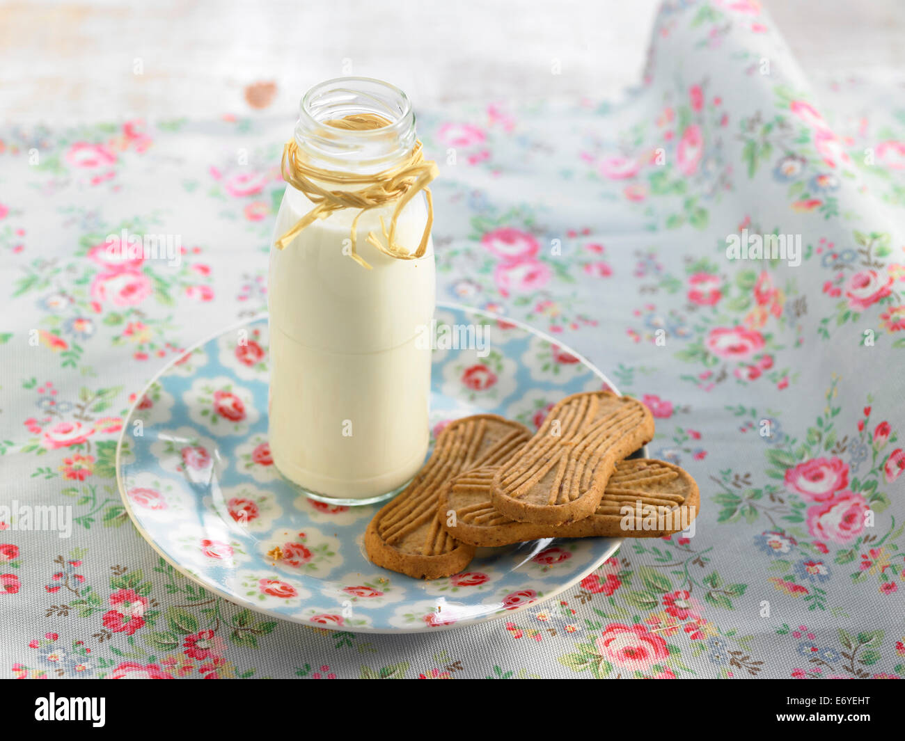 Bottle of milk and cookies Stock Photo