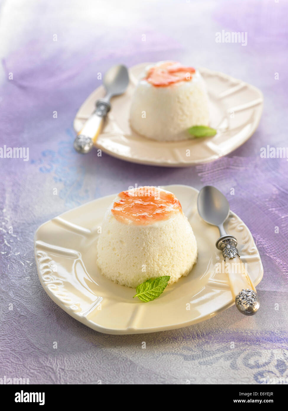 Yoghurt mousse with tomato sauce Stock Photo