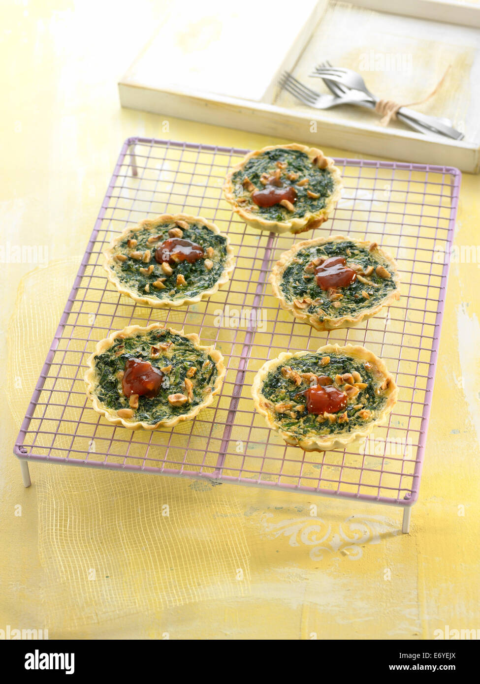 Spinach-cheese small quiches Stock Photo