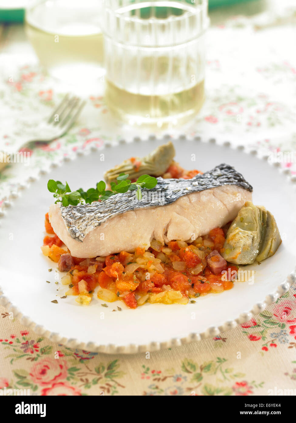 Cod and diced vegetables Stock Photo