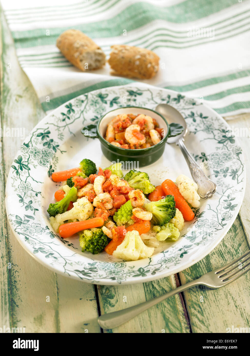 Steamed vegetables with shrimps in sauce Stock Photo