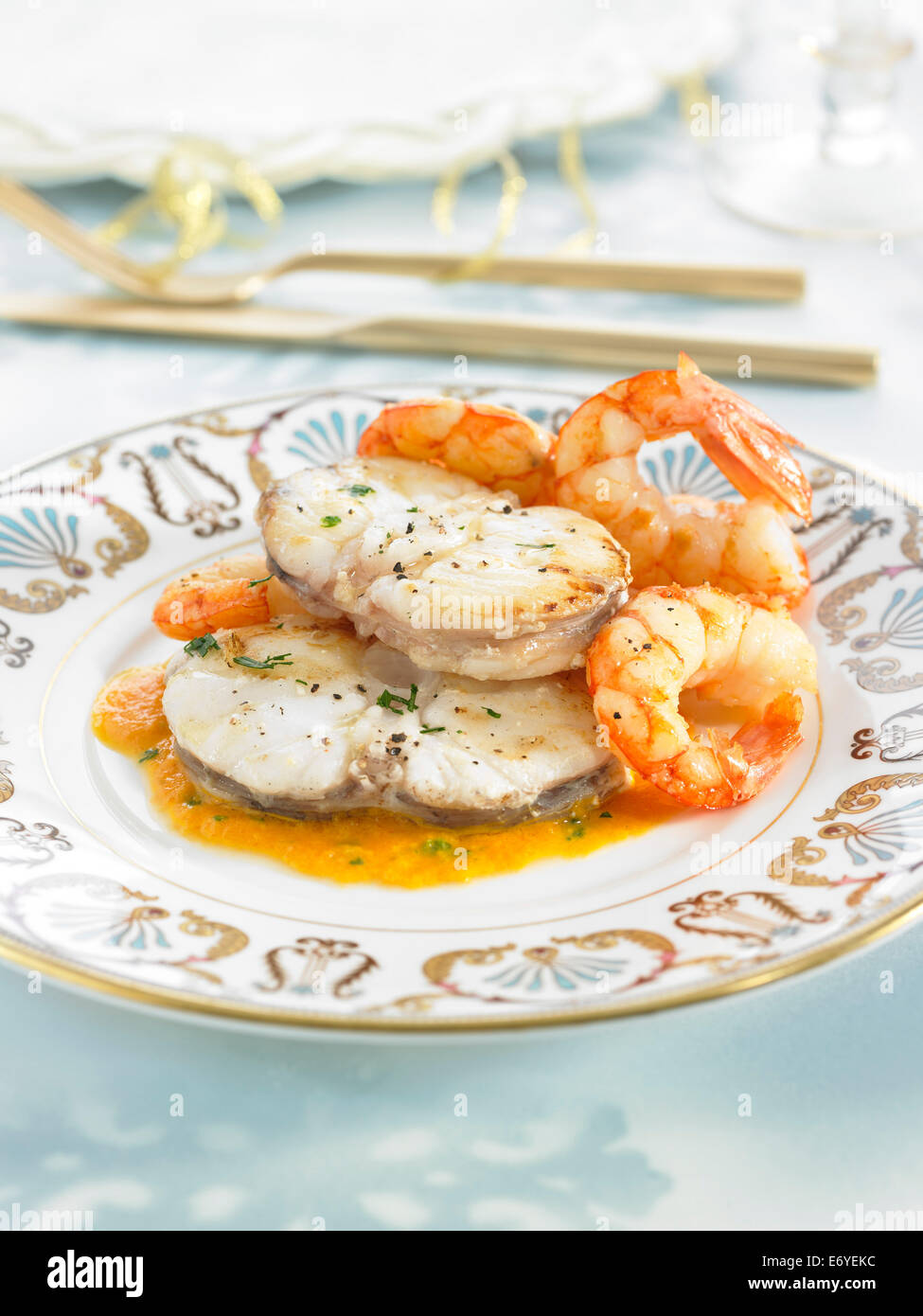 Monkfish tail with king prawns Stock Photo