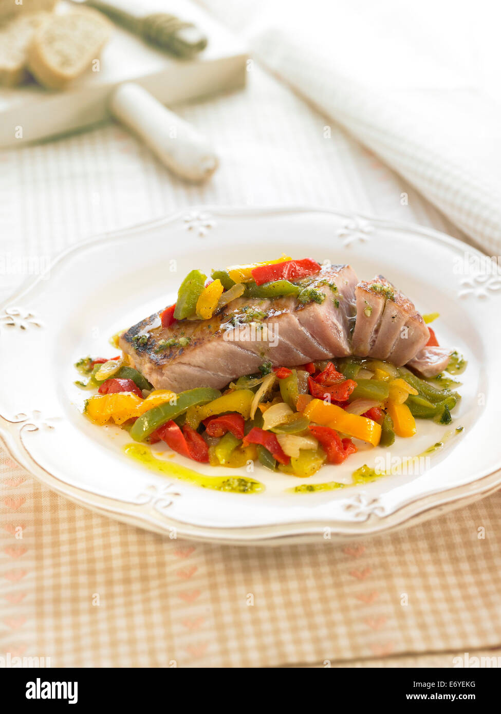 Tuna with three-colored bell peppers Stock Photo