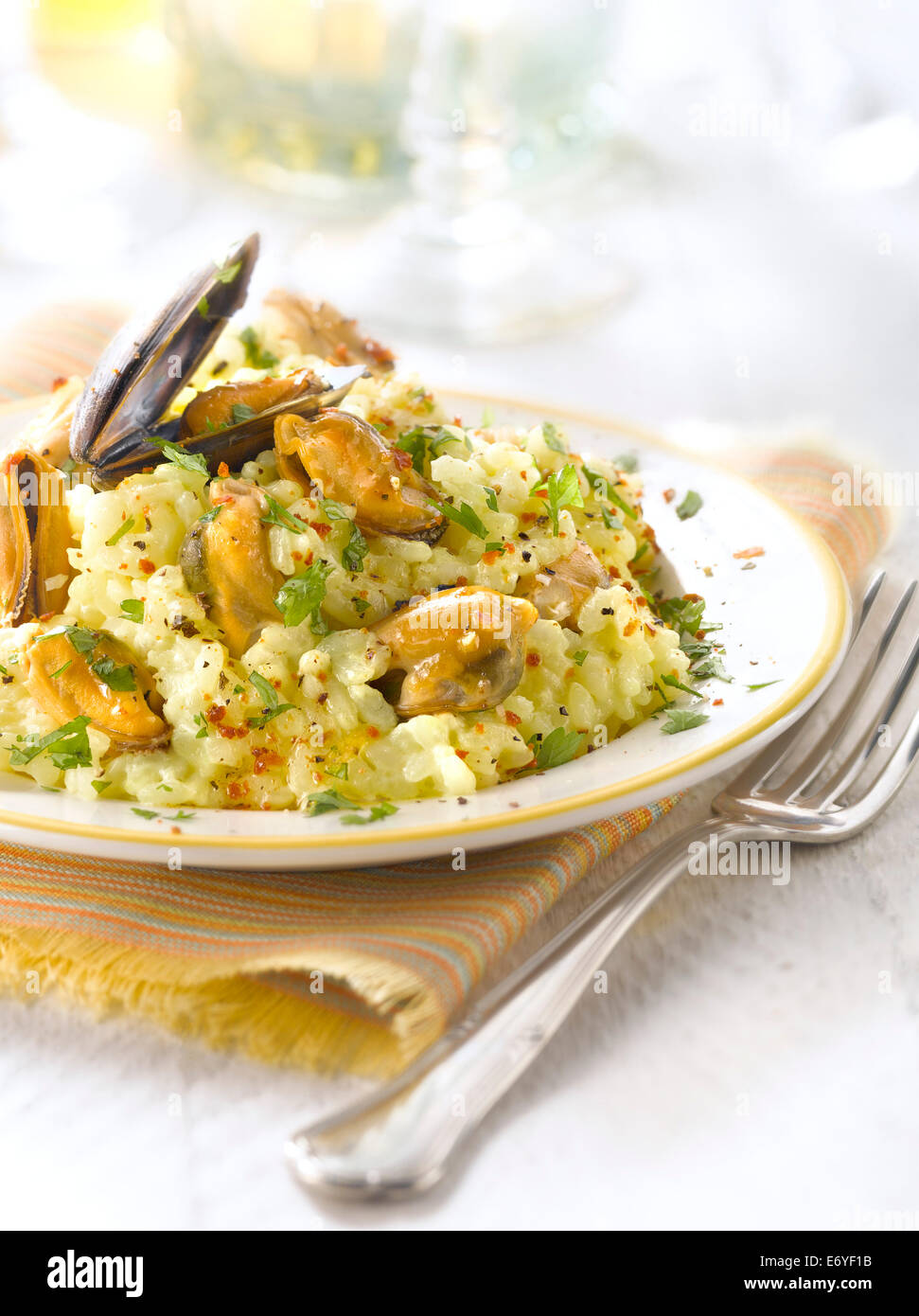 Risotto with mussels and saffron Stock Photo