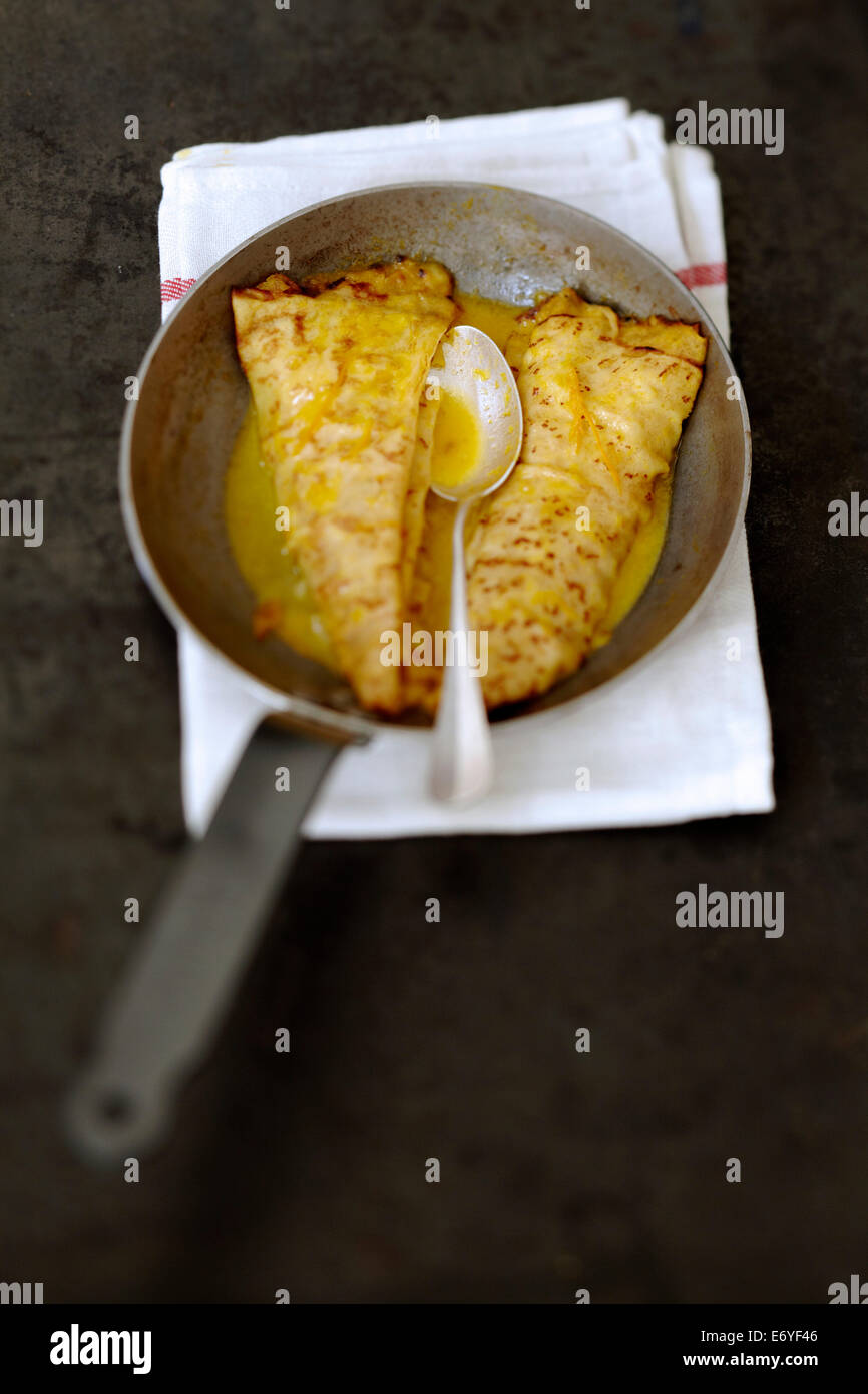 Preparing Crêpes Suzette in a frying pan Stock Photo Alamy