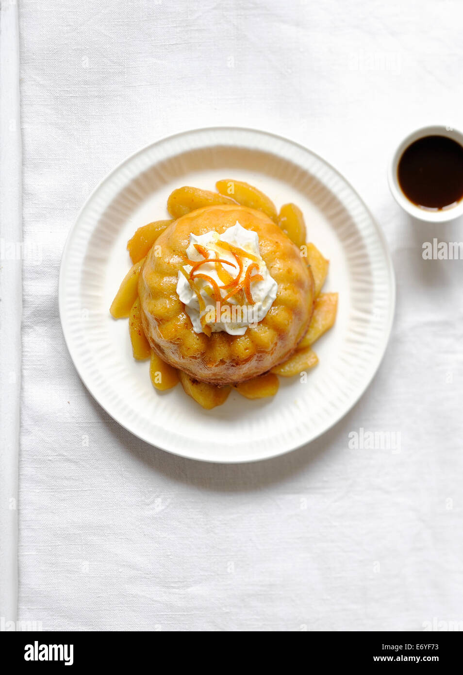 Rum baba with apples Stock Photo Alamy