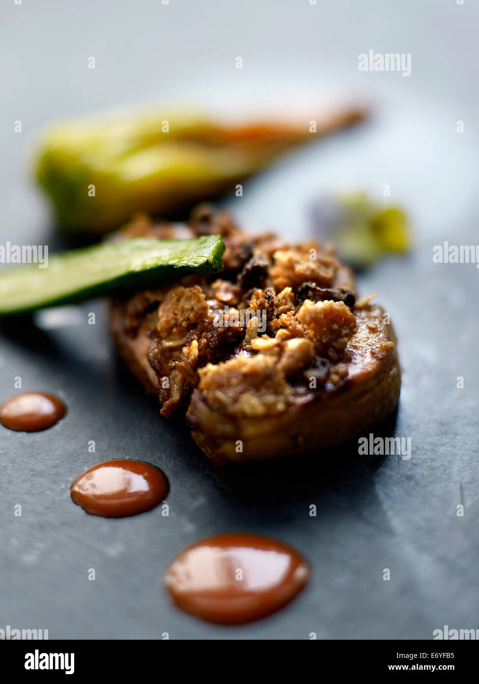 Pan-fried foie gras with dried fruit,creamed Espelette pepper sauce Stock Photo