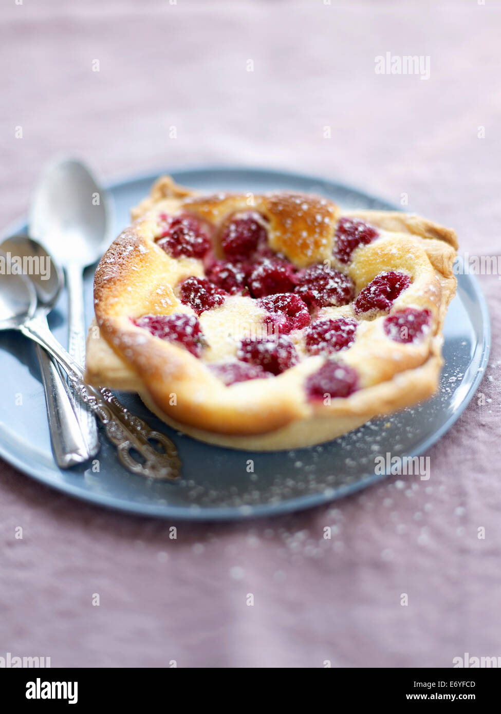 Cheesecake-style raspberry tartlet Stock Photo