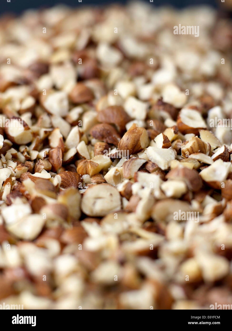 Coarsly crushed hazelnuts Stock Photo