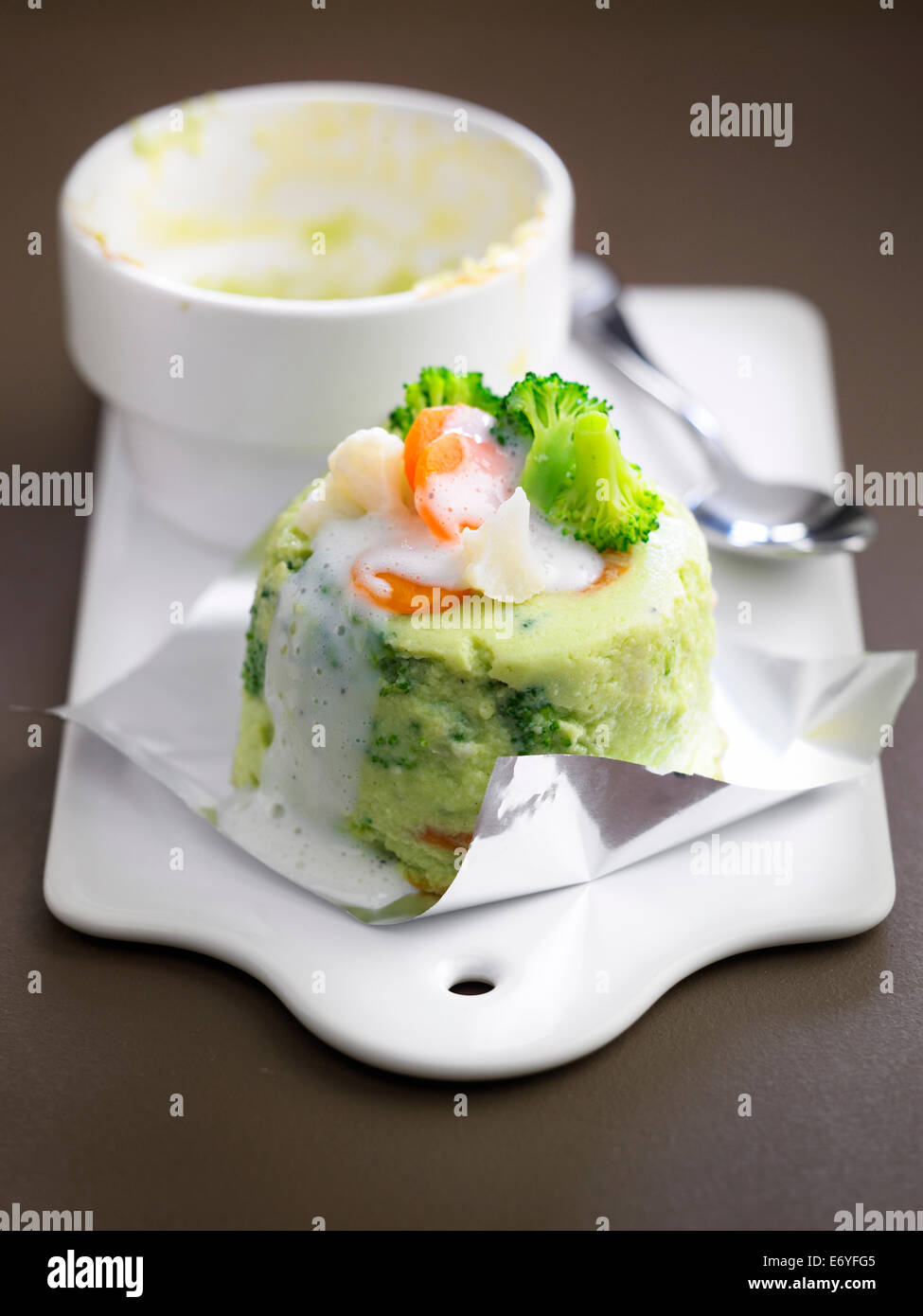 Broccoli puree and carrot timbale Stock Photo