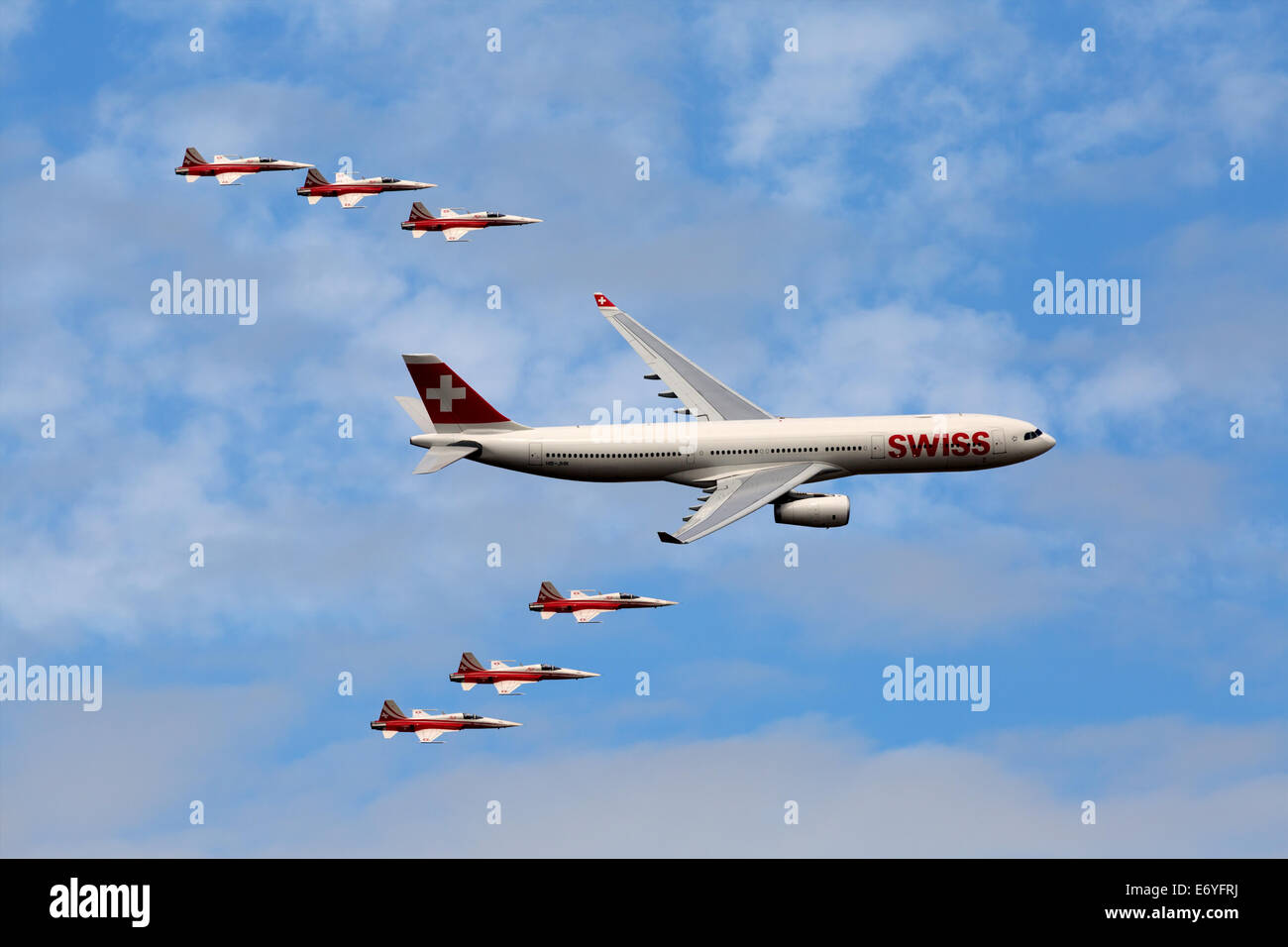 Payerne, Switzerland, 30th Aug, 2014.Airbus A330-300 HB-JHN joined by the Patrouille Suisse at the air Show at AIR14 on Saturday Stock Photo