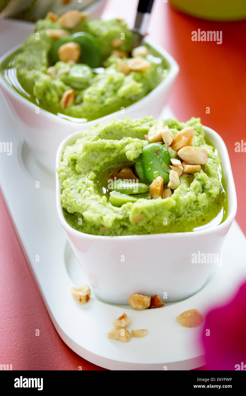 Broad bean hummus with peanuts Stock Photo Alamy