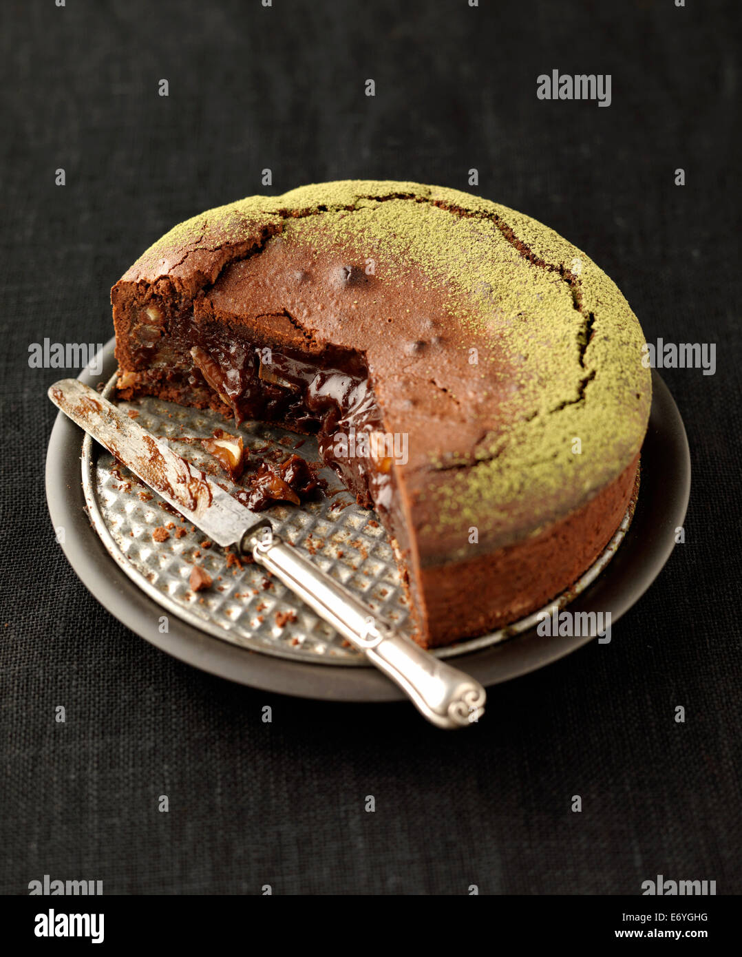 Runny chocolate and date cake Stock Photo Alamy