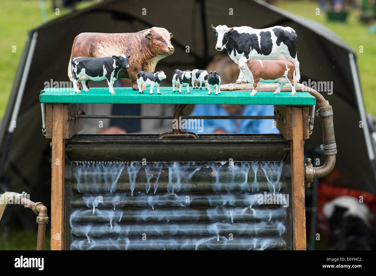 Early 20th century milk cooler demonstrated at the Aylsham Agricultural Show, Norfolk, UK. Stock Photo
