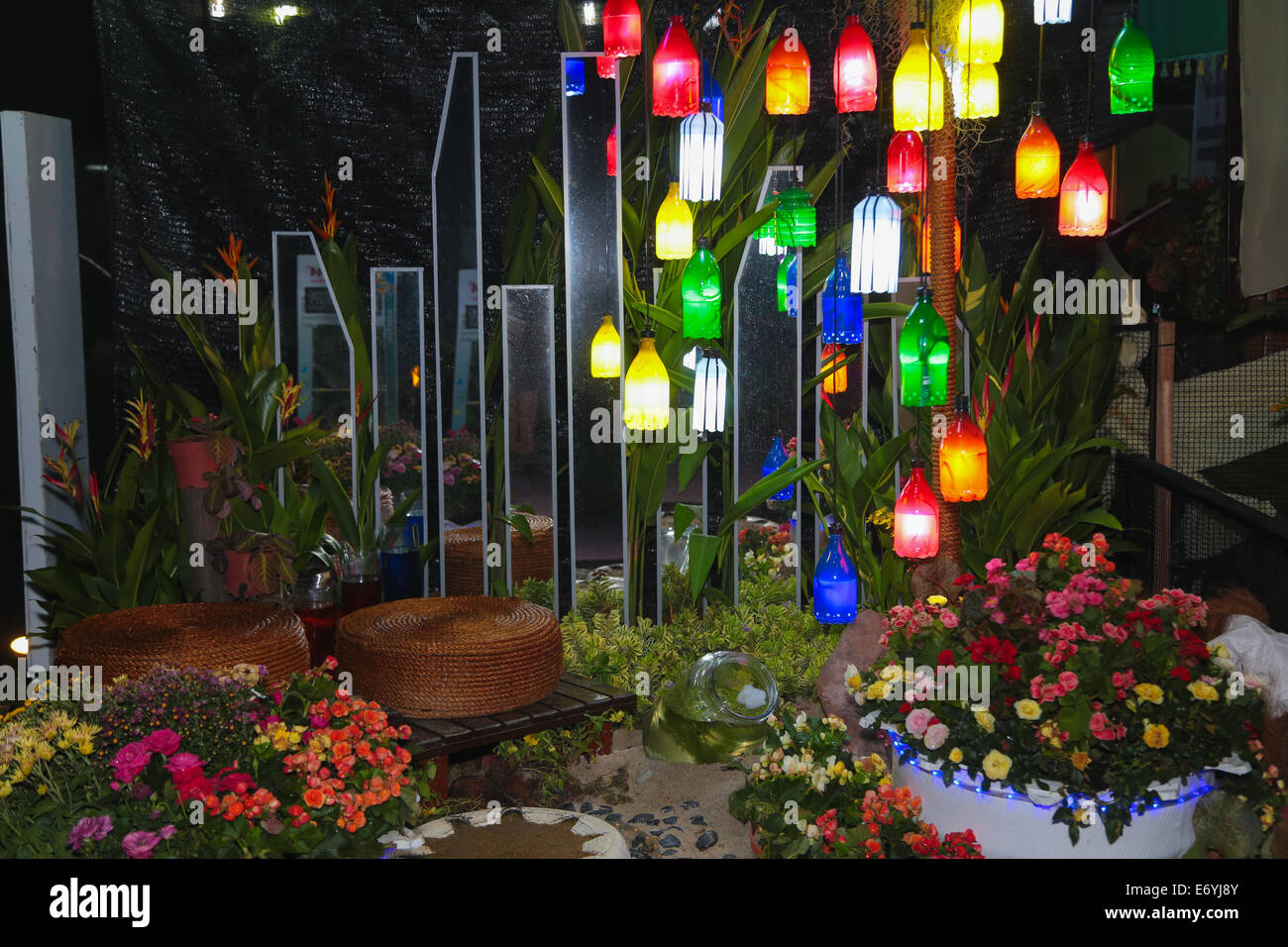 Garden decorated with lighting decos and beautiful flower arrangements ...