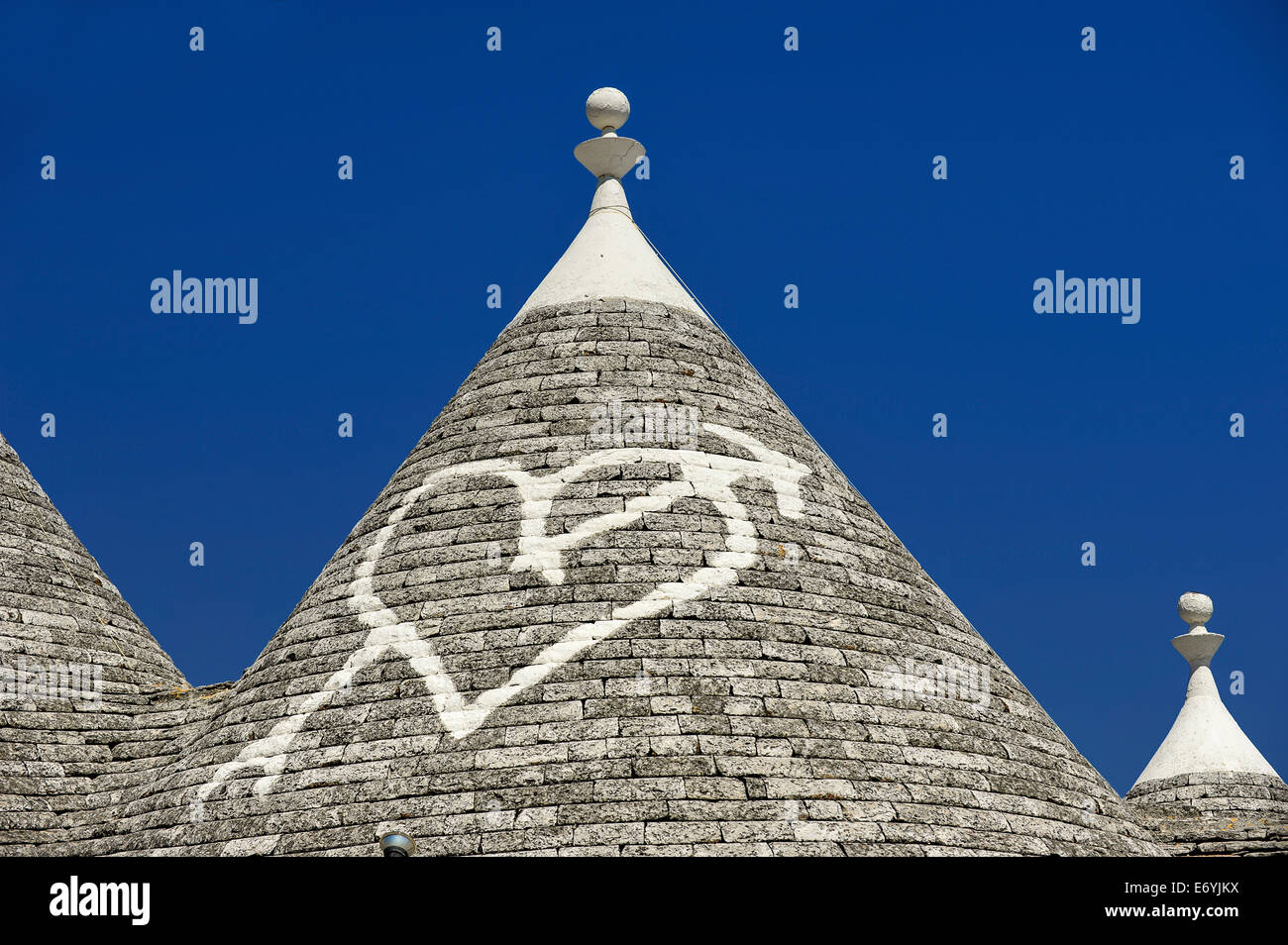 Apulia Symbol Italy Puglia Alberobello symbols drawn on the bottom of the trullo cone ...