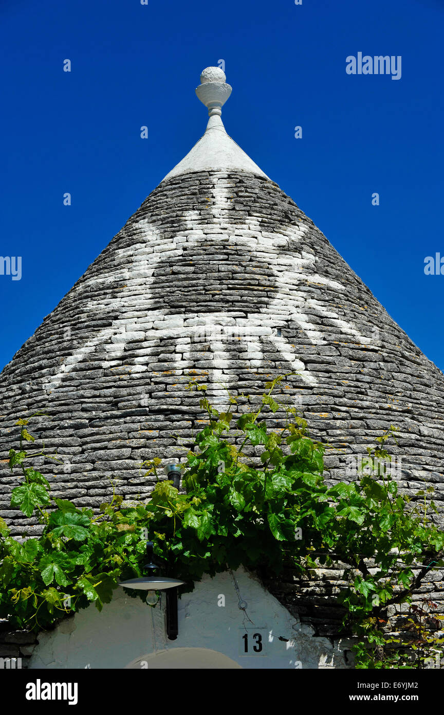 Apulia Symbol Italy Puglia Alberobello symbols drawn on the bottom of the trullo cone ...