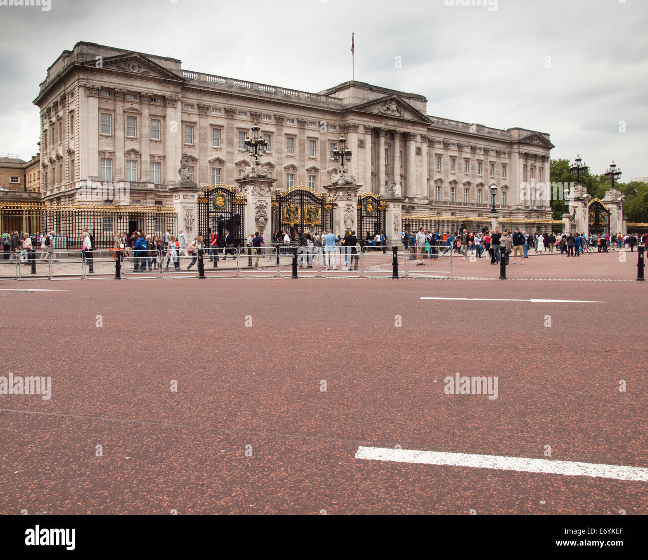 buckingham palace viewed across spur road on an overcast cloudy day Stock Photo