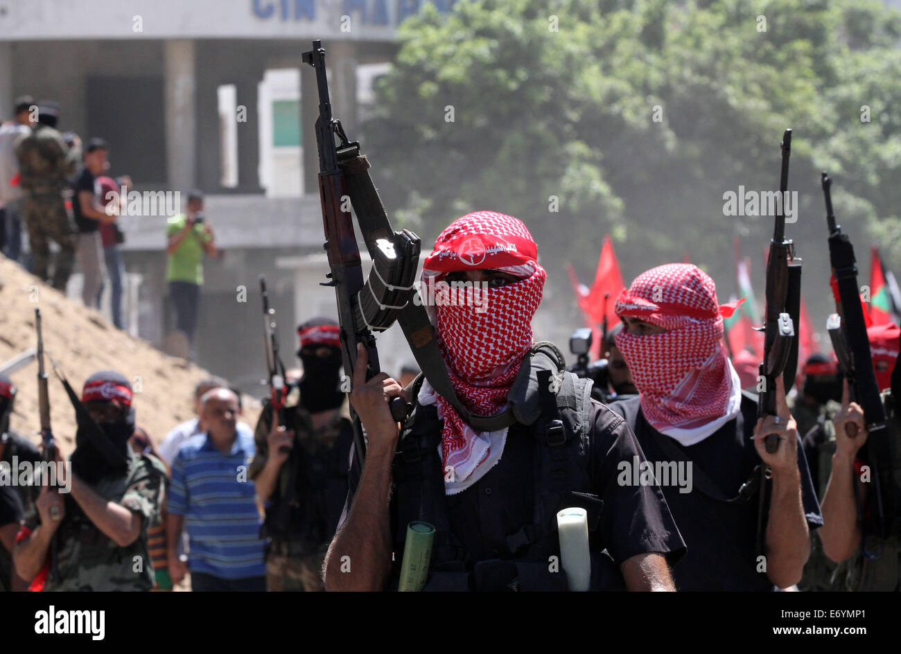 Gaza. 2nd Sep, 2014. Palestinian militants from the Popular Front for the Liberation of Palestine (PFLP) take part in a military parade one week after the Egypt-mediated ceasefire between Israel and Hamas in Gaza city, on Sept. 2, 2014. Credit:  Yasser Qudih/Xinhua/Alamy Live News Stock Photo