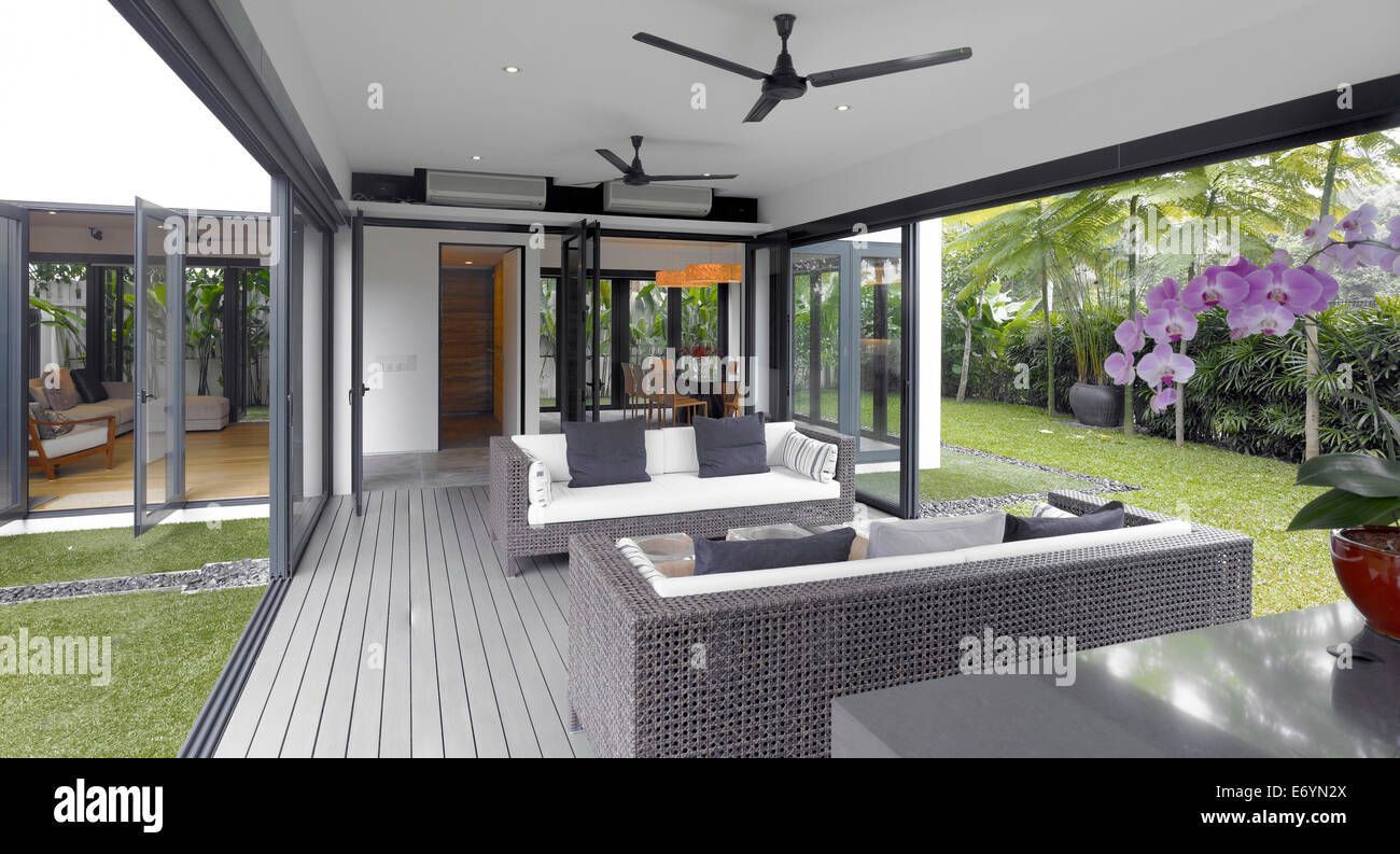 Living room with fully opening side walls for air circulation in modern ... - Side Properties With Living Walls