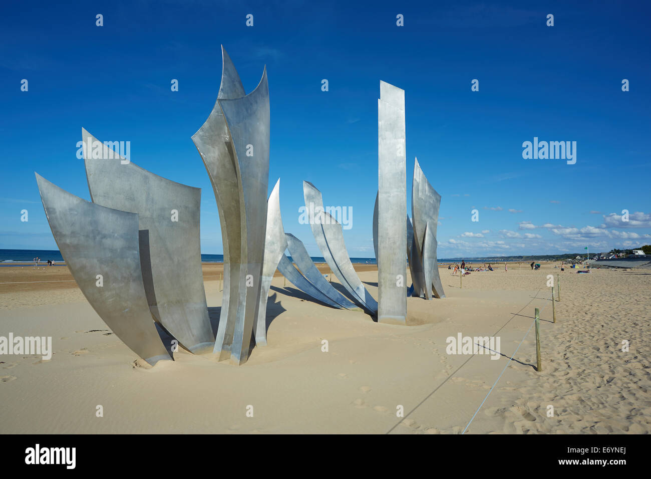 Omaha Beach, Normandy, France featuring the commemorative sculpture 'Les Braves' by artist Anilore Banon Stock Photo