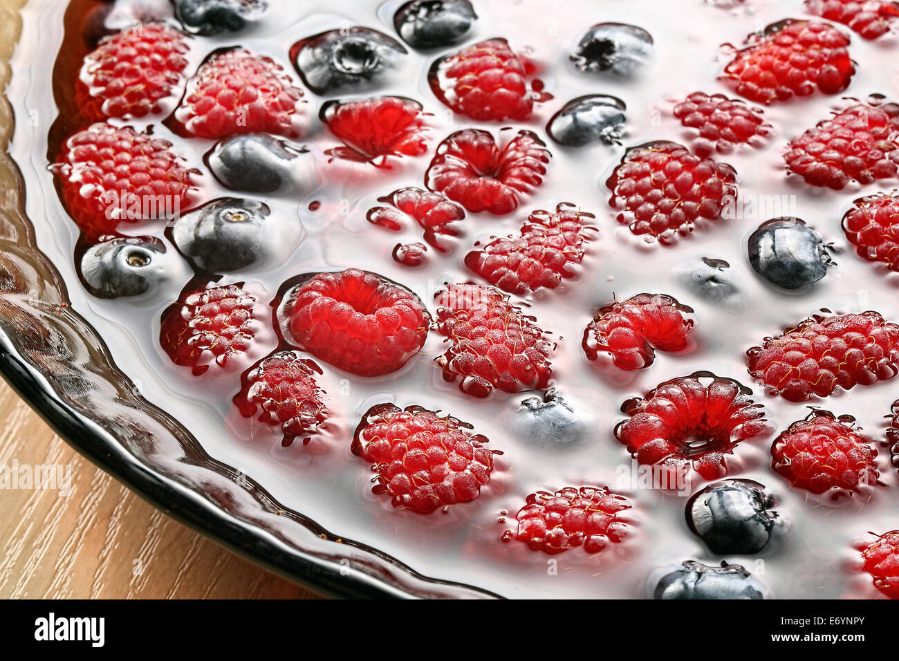 Fruit jelly with raspberries and blueberries Stock Photo Alamy