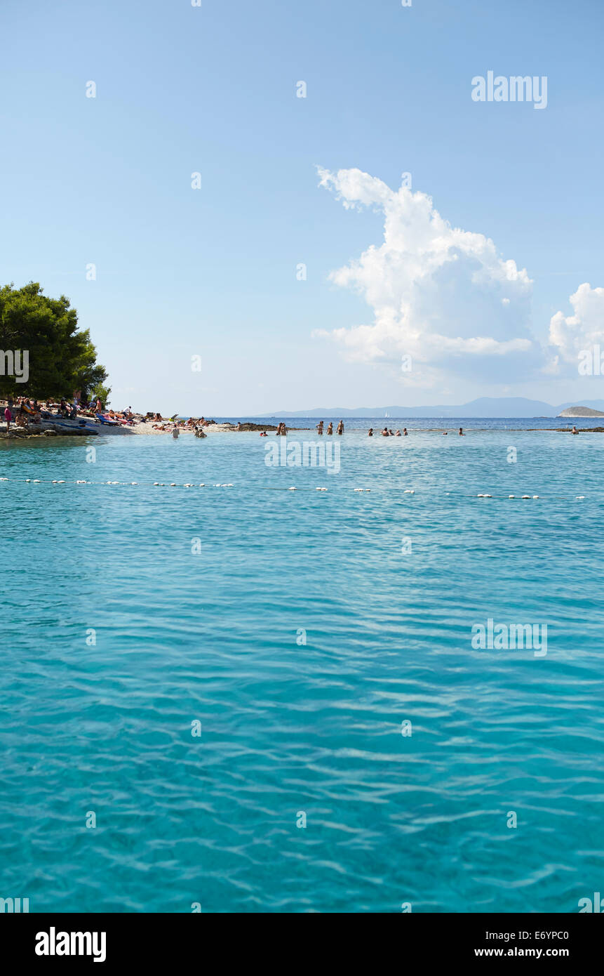 Beautiful exclusive beach on Otok Marinkovac island near Hvar, Croatia. This beach is only accessible but boat. Great place to s Stock Photo
