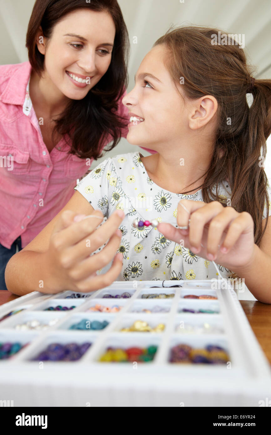 Mother and daughter making jewellery Stock Photo