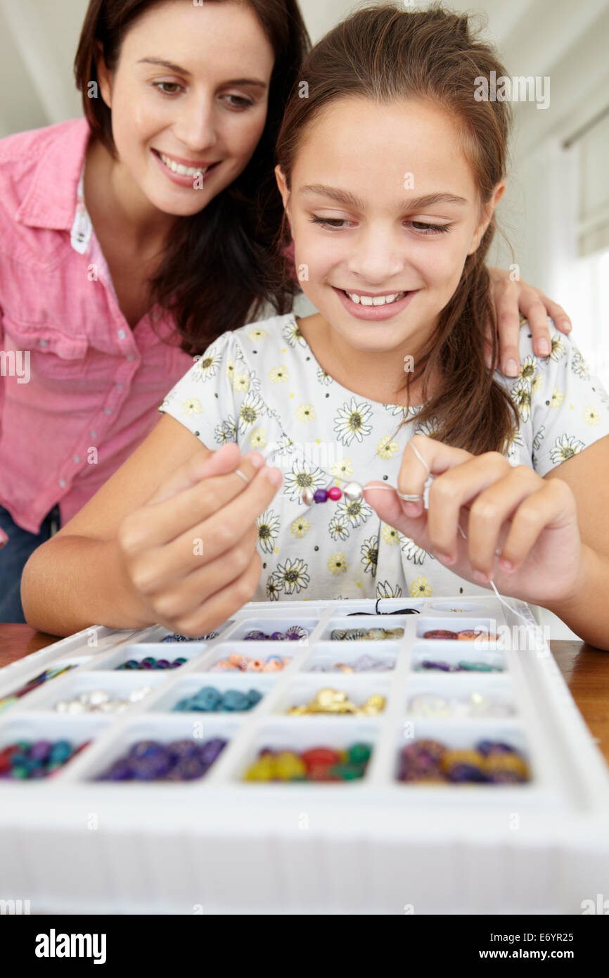 Mother and daughter making jewellery Stock Photo