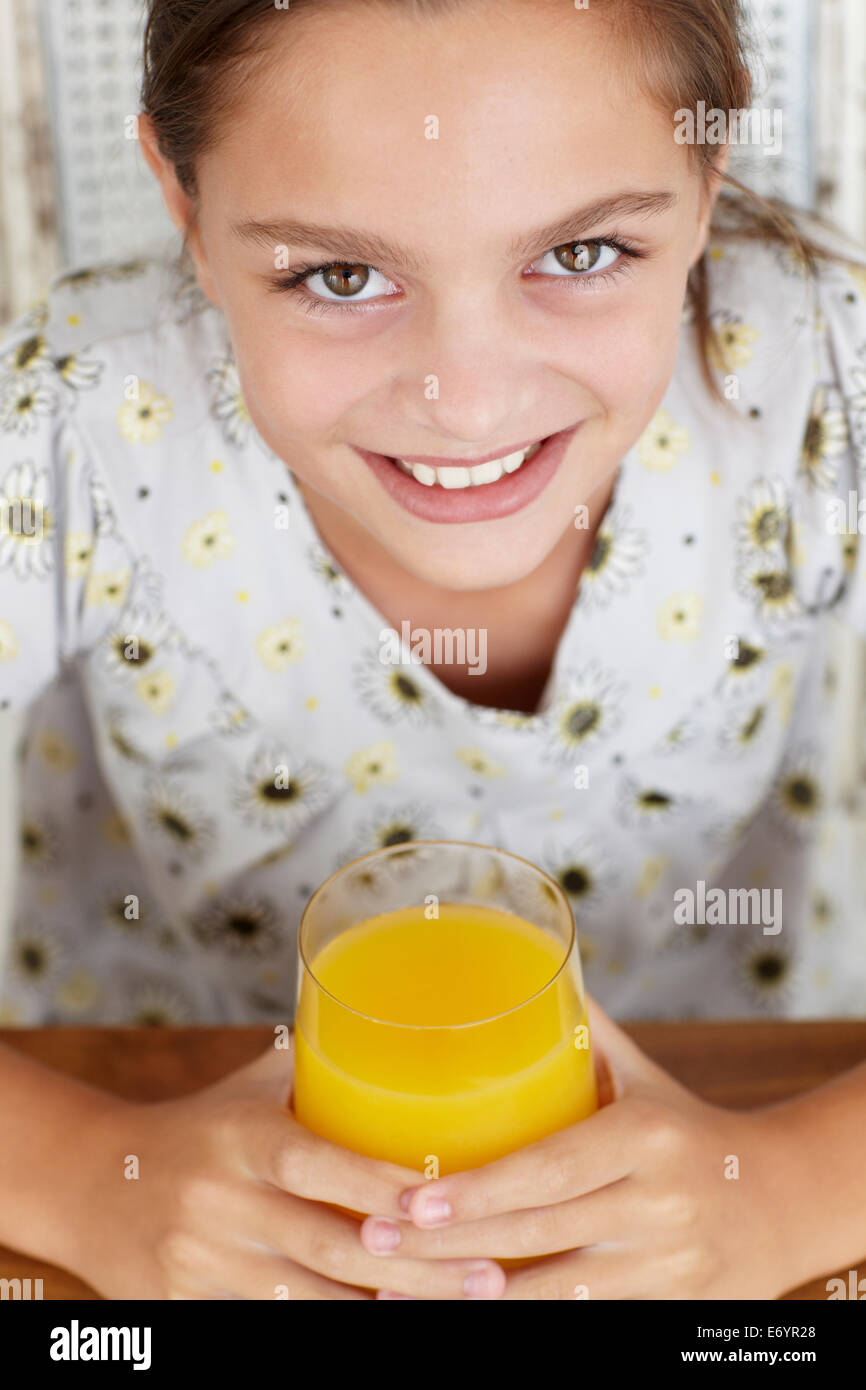Young girl with orange juice Stock Photo Alamy