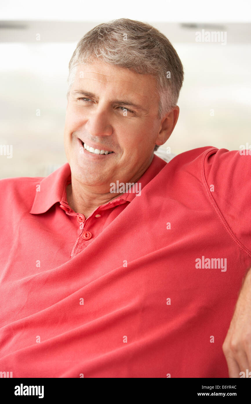 Mid age man at home Stock Photo