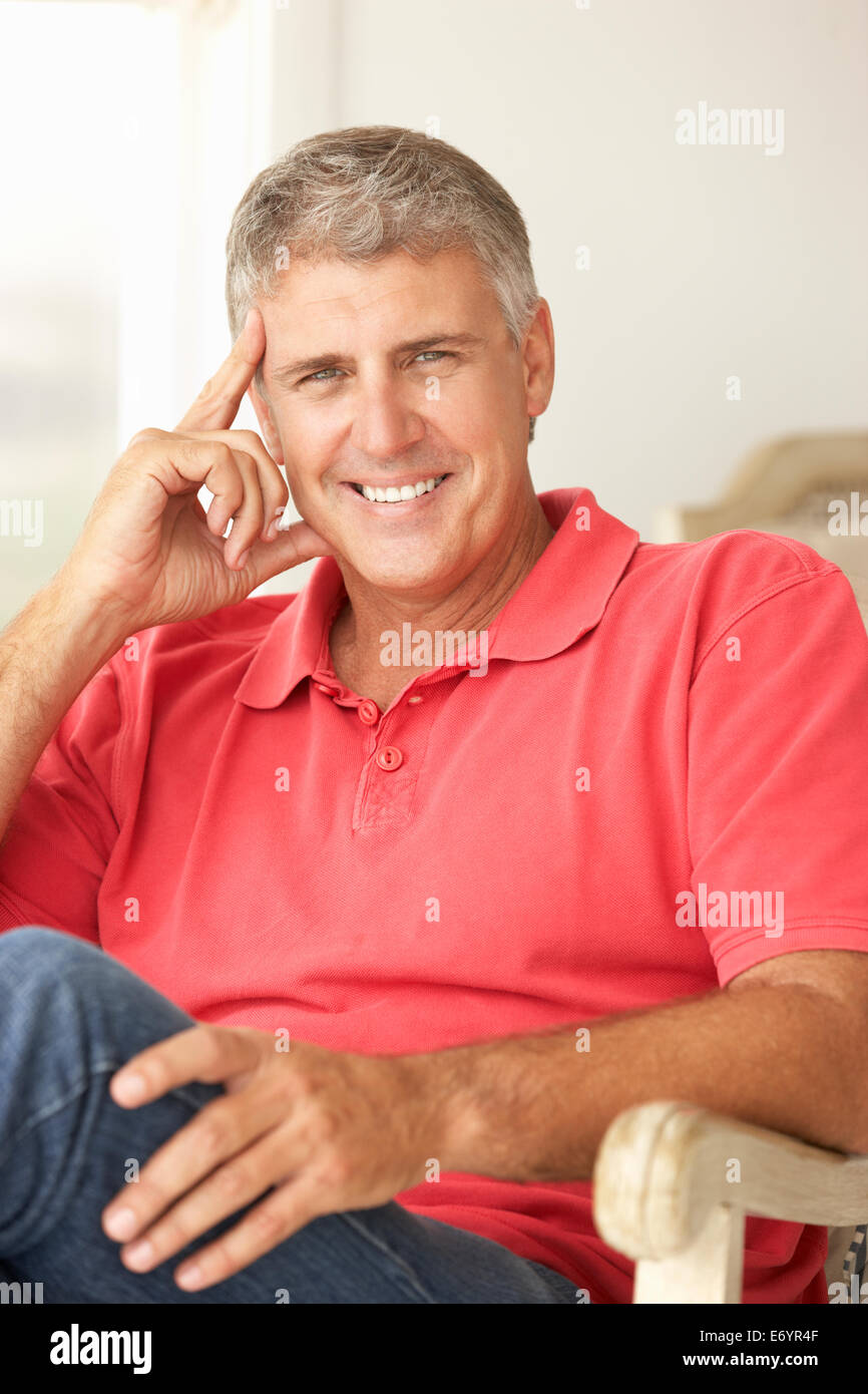 Mid age man at home Stock Photo