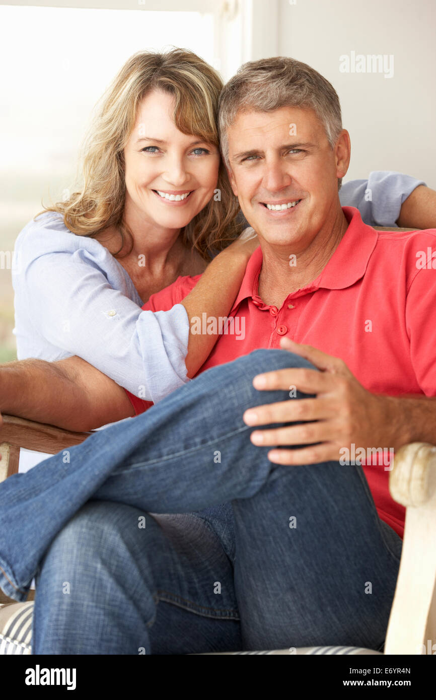 Mid age couple at home Stock Photo