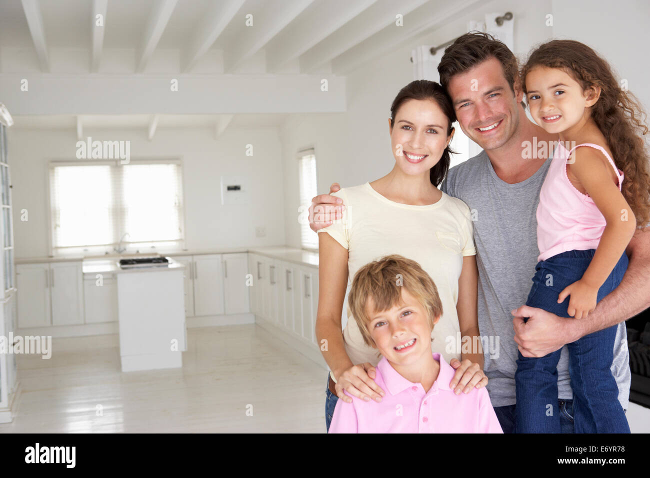 Family in new home Stock Photo
