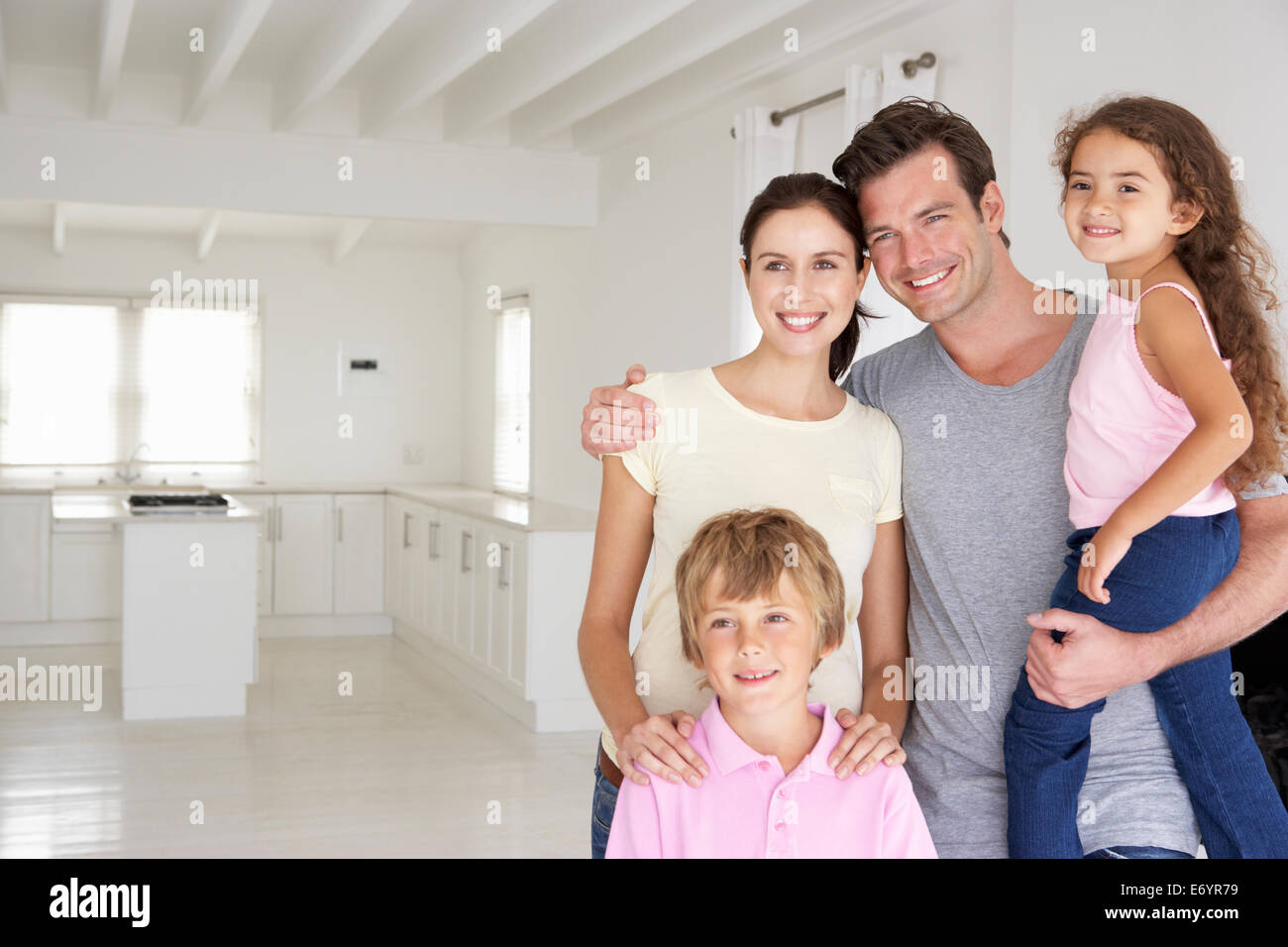 Family in new home Stock Photo