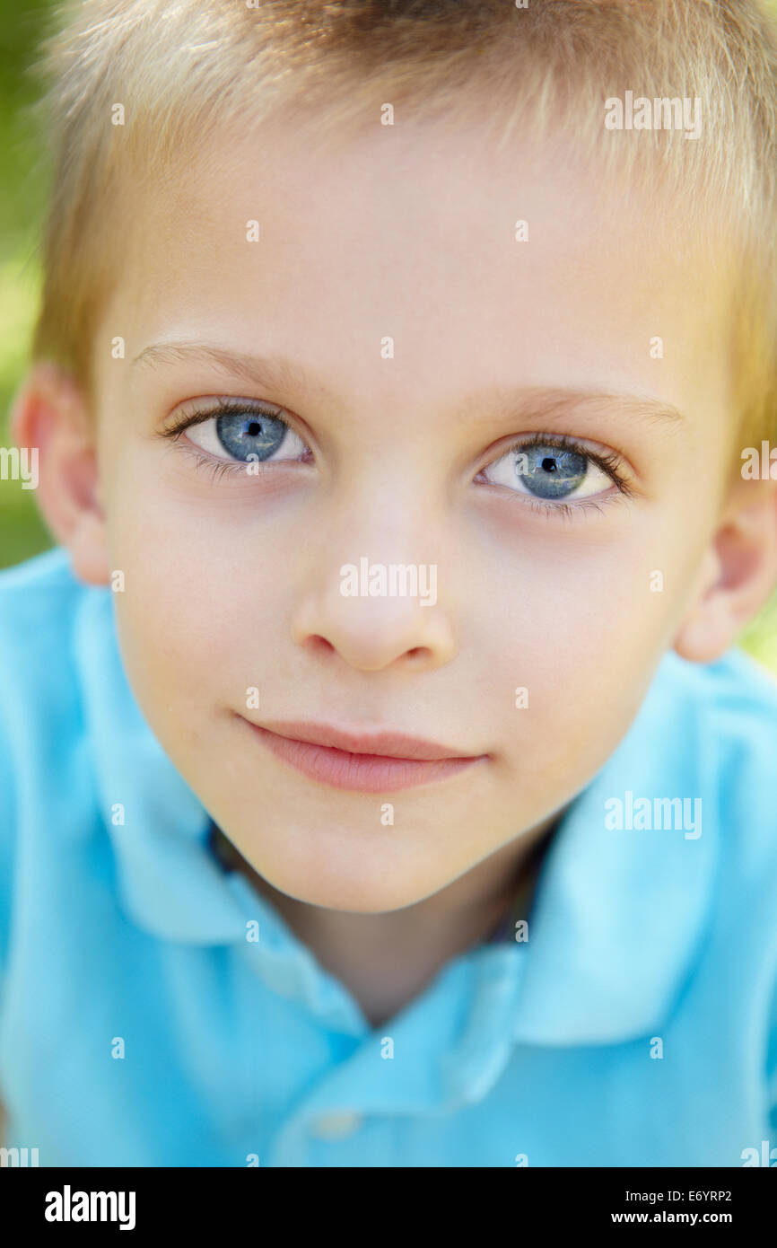 Portrait of young boy outdoors Stock Photo - Alamy