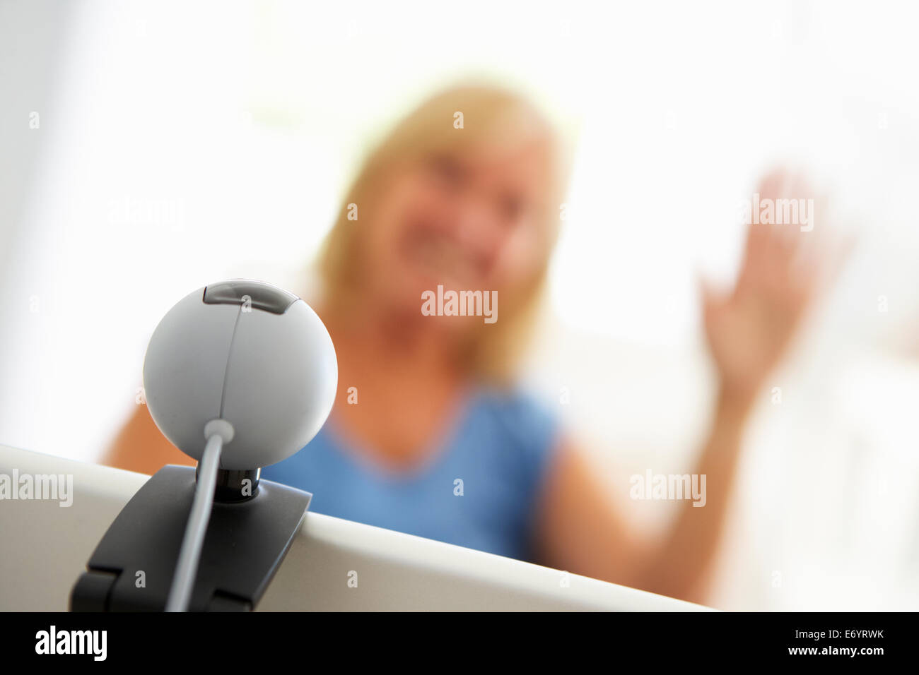 Senior woman using skype Stock Photo