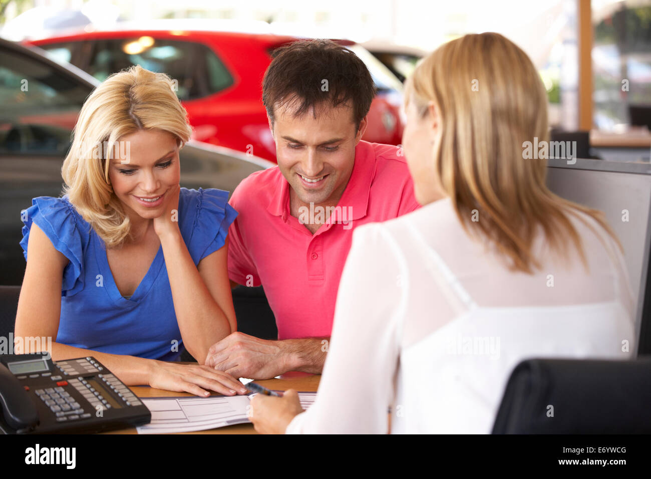 Couple buying new car Stock Photo Alamy