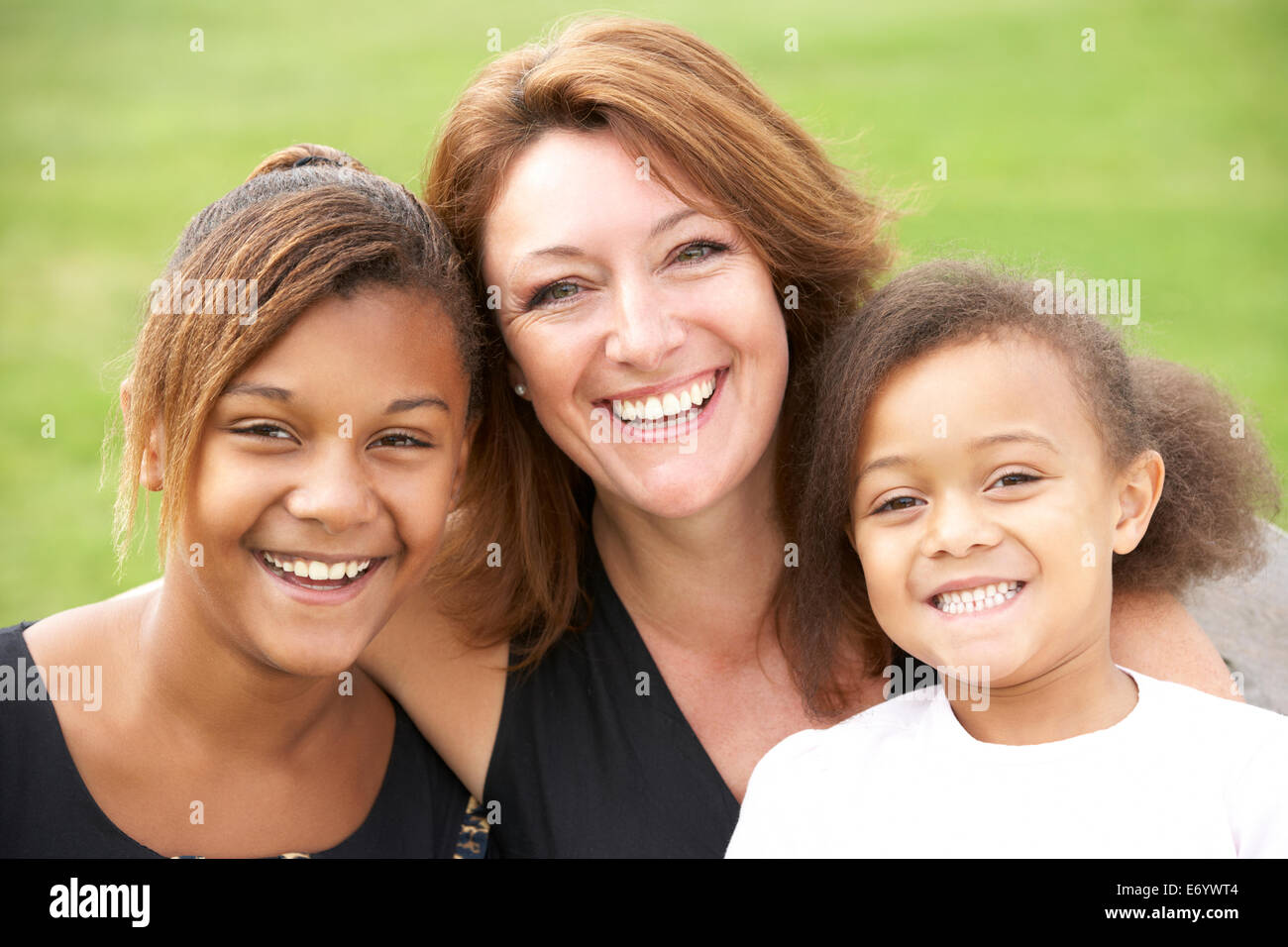 Mother and mixed race daughters Stock Photo
