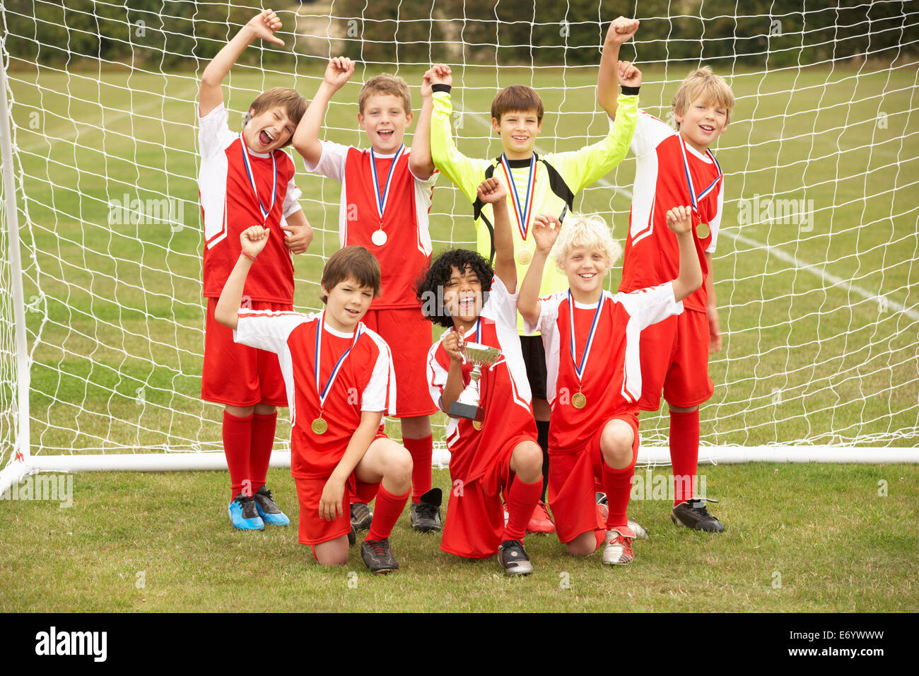 Winning junior soccer team portrait Stock Photo