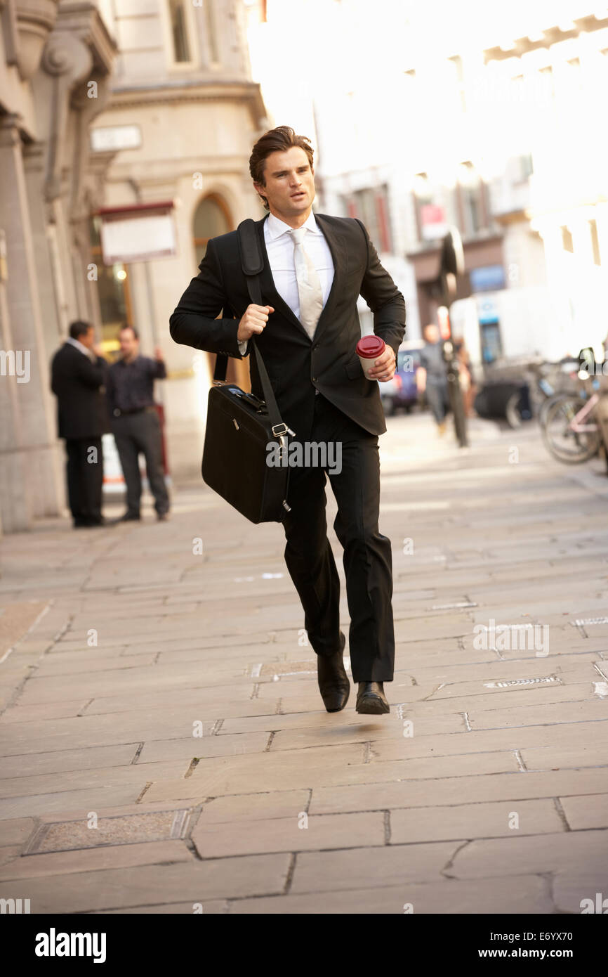 Businessman hurrying to work Stock Photo