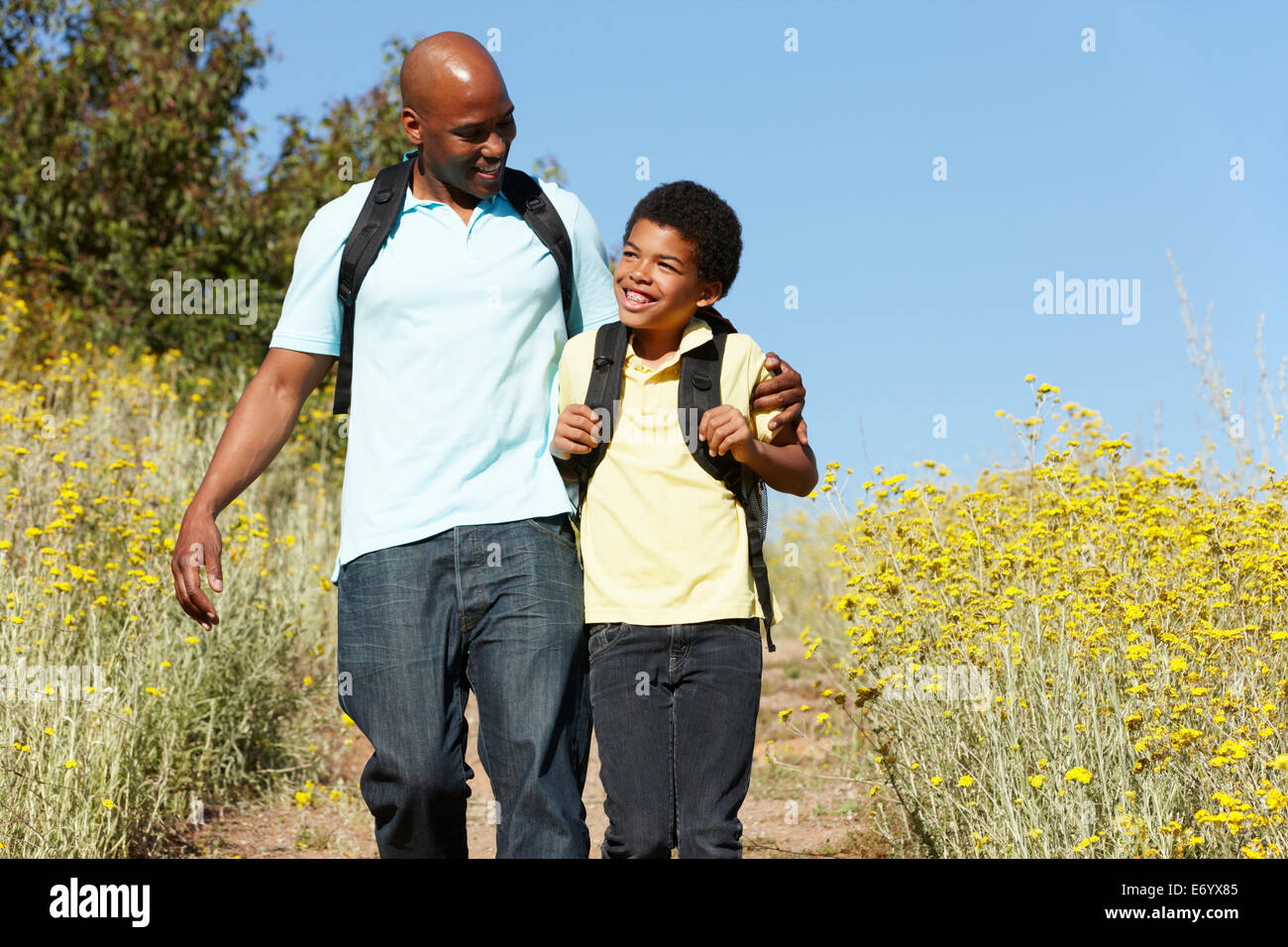 Father and son on country hike Stock Photo