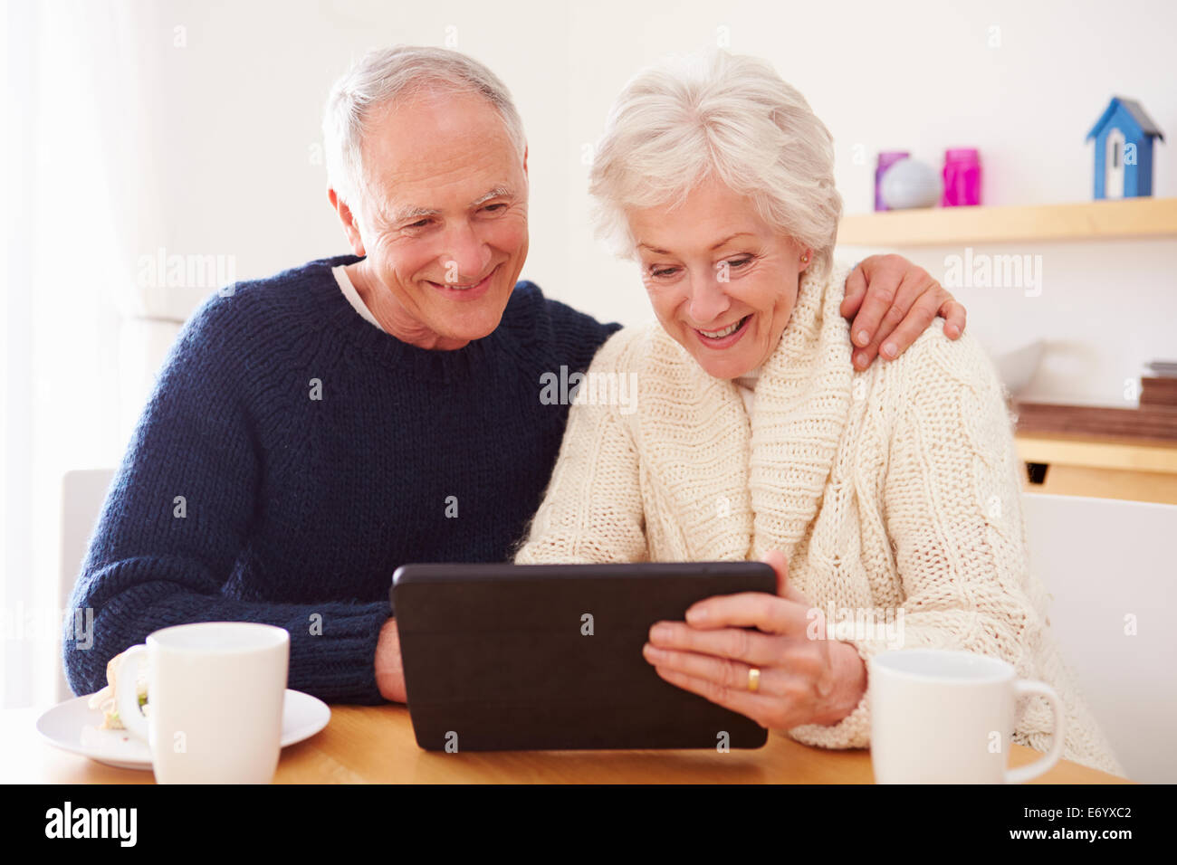 Happy women using digital hi res stock photography and images Alamy Happy women using digital hi res stock photography and images Alamy