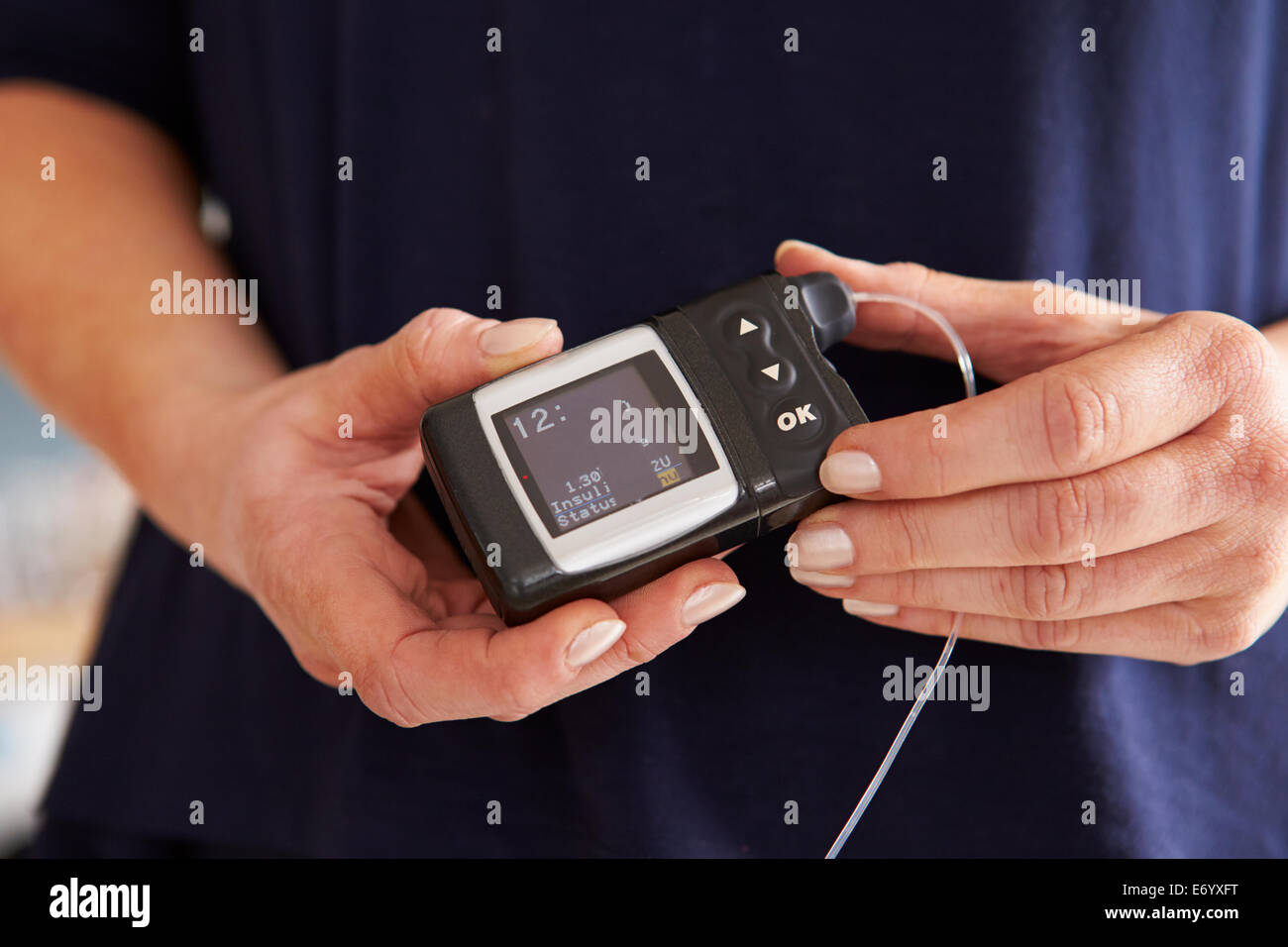 Couple Looking Through Personal Finances At Home With Dog Stock Photo