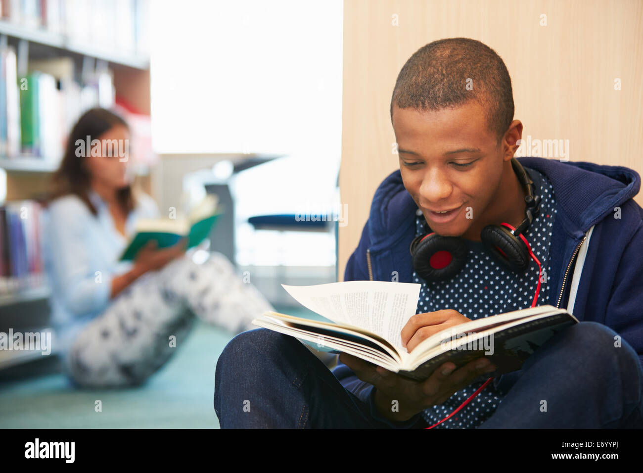 Two College Students Studying In Library Stock Photo - Alamy