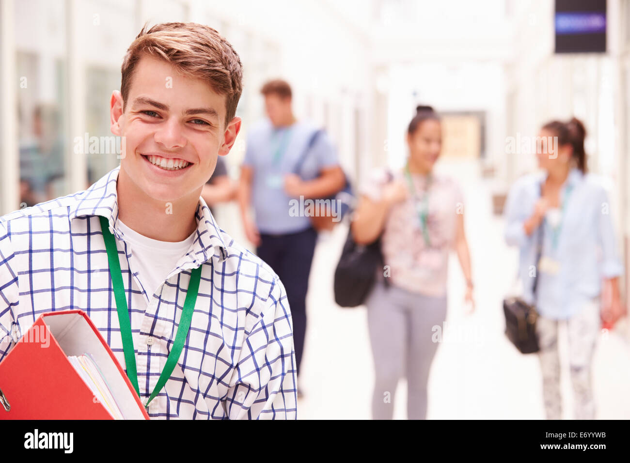 Portrait Of Male College Student In Hallway Stock Photo
