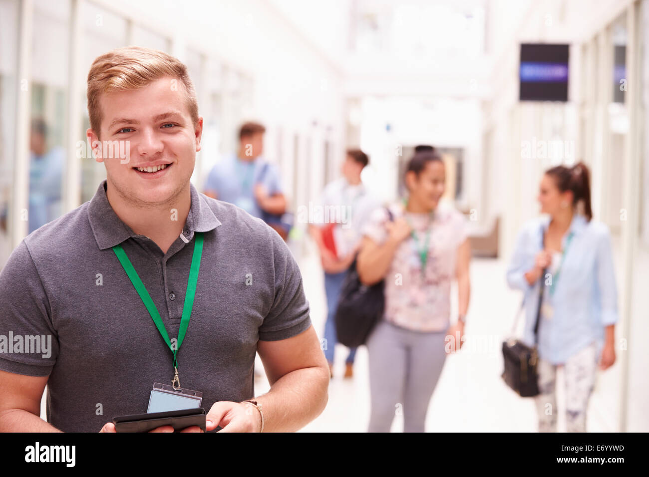 Portrait Of Male College Student In Hallway Stock Photo