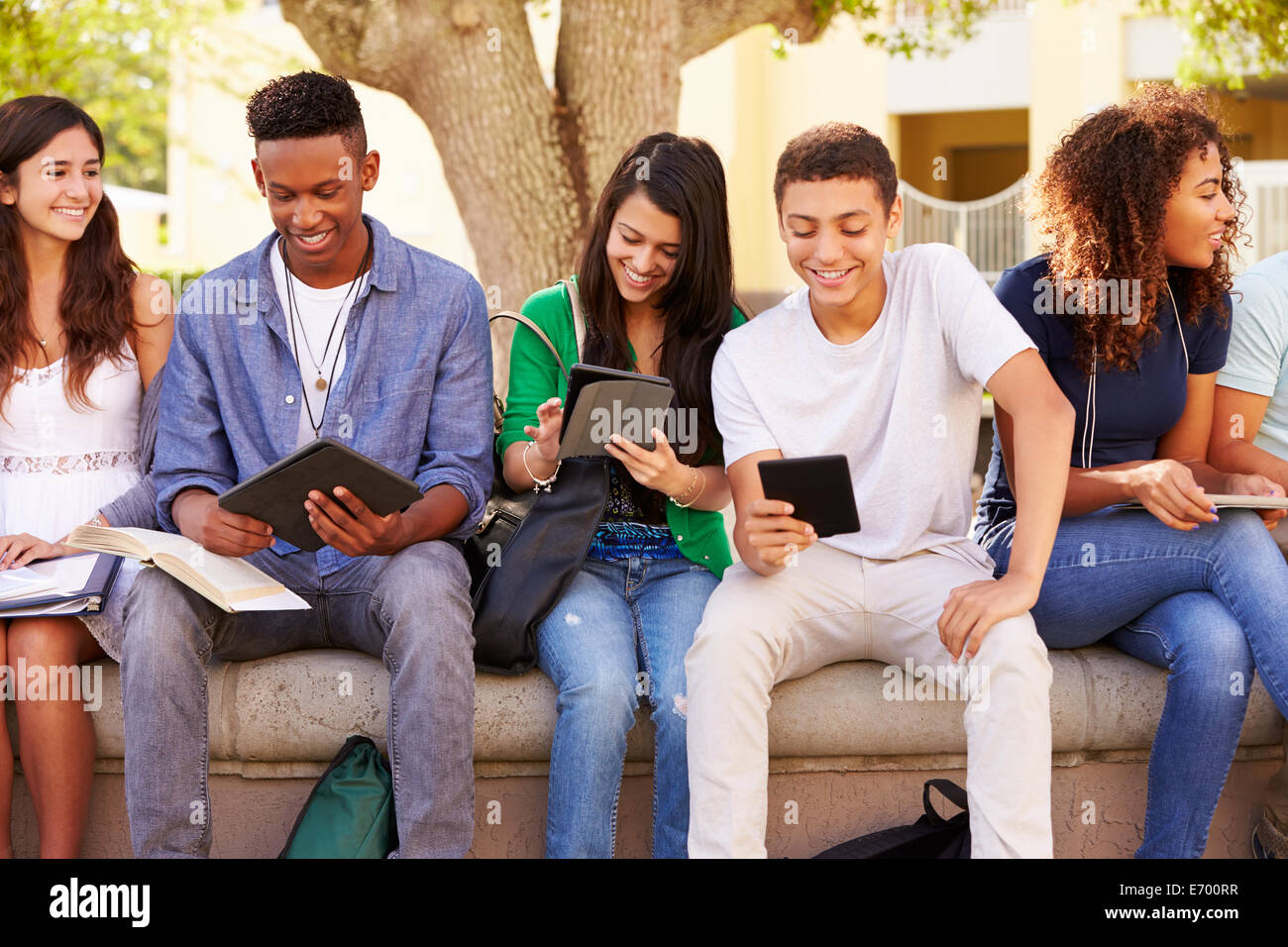 High School Students Collaborating On Project On Campus Stock Photo - Alamy